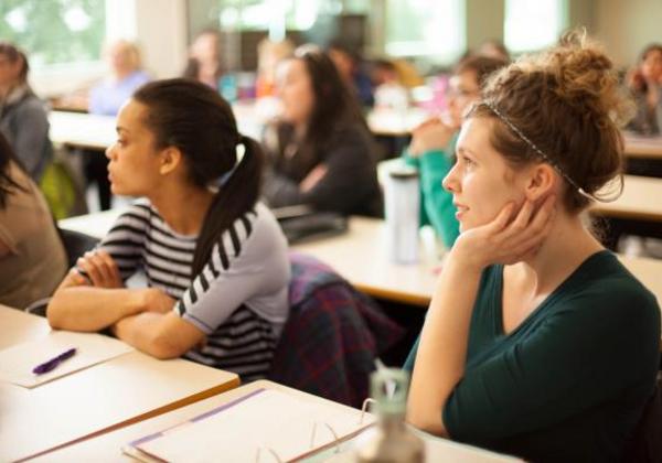 Students sitting and listening in the classroom