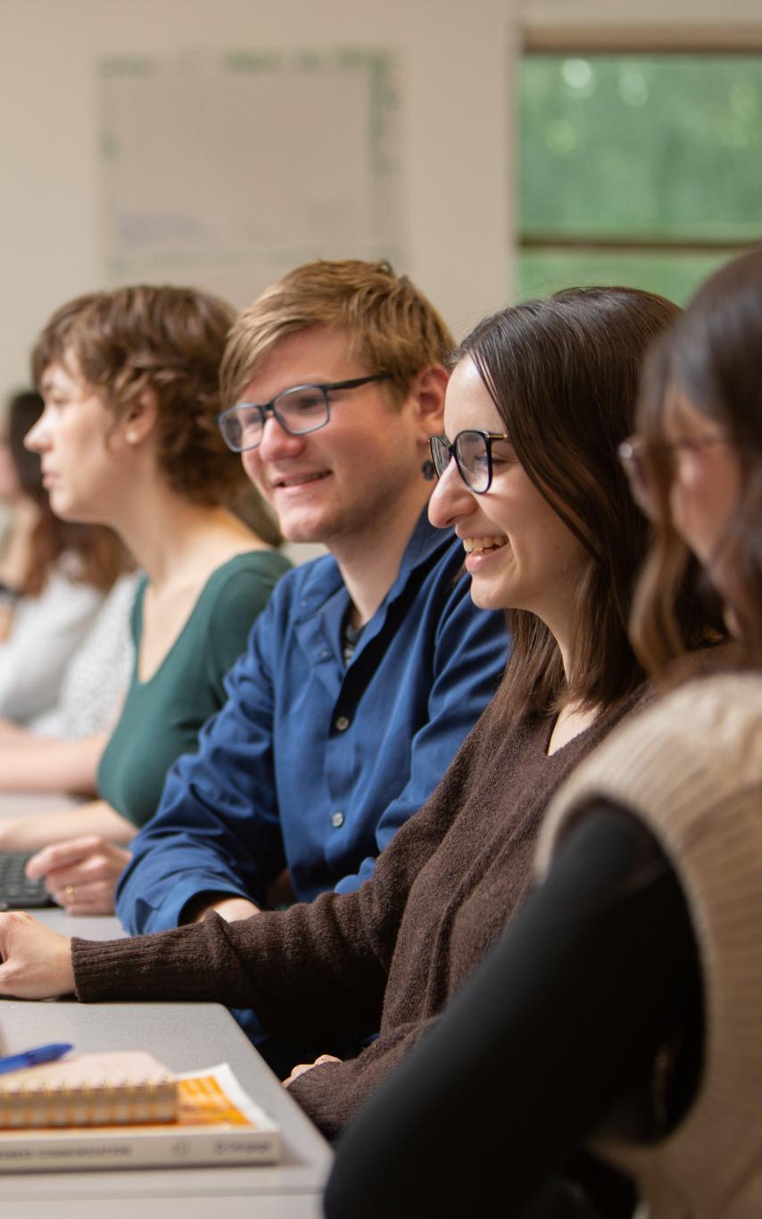 Students in a classroom with computer screens