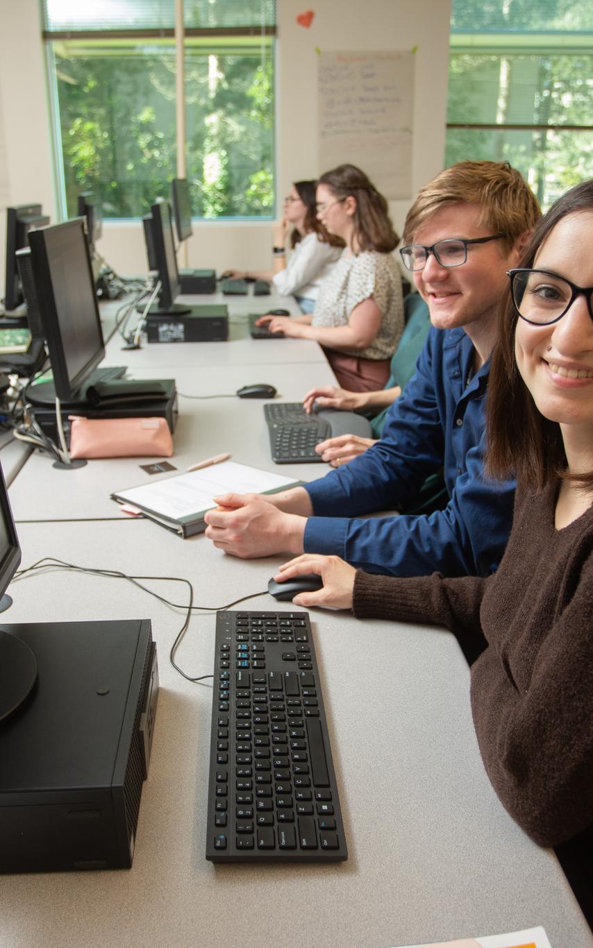 Students working together in a computer lab